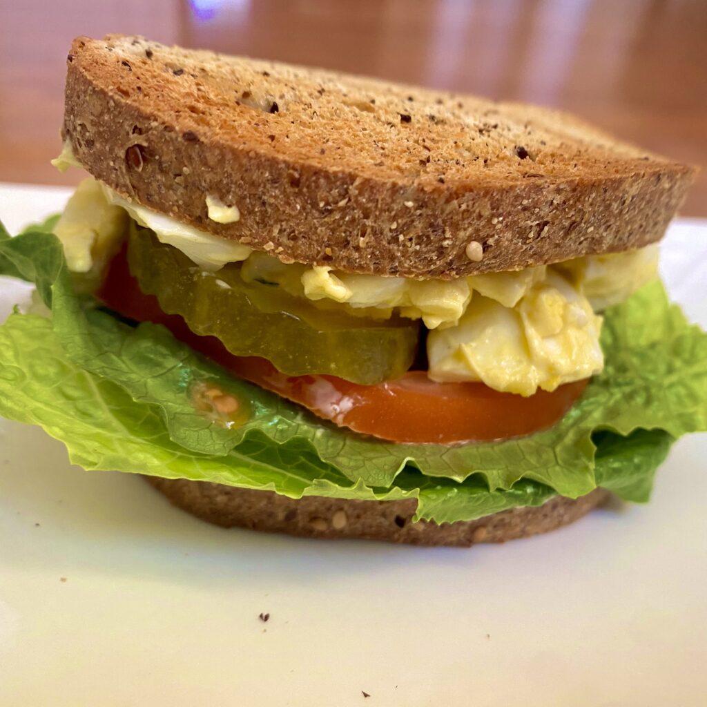low carb egg salad egg sandwich with lettuce and tomato